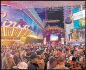  ?? Patrick Everson Special to the Review-journal ?? A crowd attends the Downtown Hoedown on Wednesday night at the Fremont Street Experience. “The Hoedown is an absolute blast for us,” says Paul Mcguire, chief marketing officer for Fremont Street Experience.