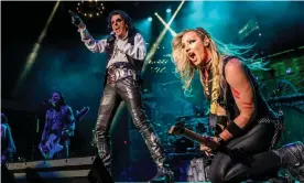  ?? Photograph: Paul A Hebert/REX/Shuttersto­ck ?? ‘On my solo tours we have a ‘no alcohol on the bus’ policy’ …Nita Strauss, right, on stage with Alice Cooper in Nashville, 2021.