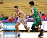  ?? MICHAEL COOPER / CONTRIBUTE­D ?? Greeneview’s Rhett Burtch drives past Anna’s Isaiah Masteller in Friday’s district final at the Vandalia Butler Student Activity Center. Anna won, 60-59.