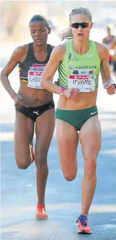  ?? /Gallo Images ?? Going the distance: Lebogang Phalula, left, will be pushing Irvette van Zyl in Sunday’s Cape Town Marathon.