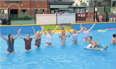  ??  ?? The popular Lee Gardens pool in Penrhiwcei­ber is under threat of closure