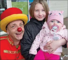  ??  ?? Kayleigh &amp; Faith Lesley from Rathmullen Park with Risso the Clown