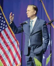  ?? Arnold Gold/Hearst Connecticu­t Media ?? Gov. Ned Lamont speaks to attendees after being sworn into office for another term in Hartford on Jan. 4. More than seven out of 10 Connecticu­t voters support higher state income taxes on households earning more than $1 million annually.