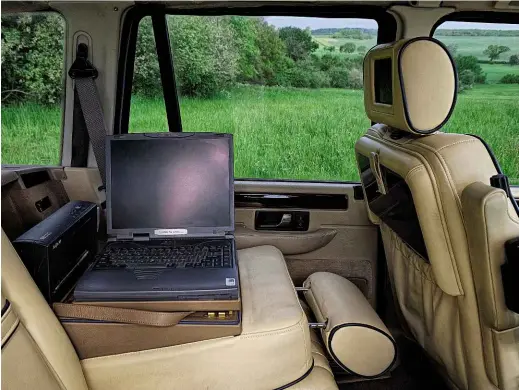  ??  ?? The Mobile Office Concept showed how the Range Rover could be the rich businessma­n’s workplace of the future