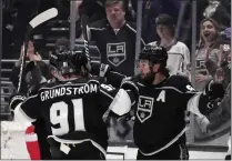  ?? MARCIO JOSE SANCHEZ — THE ASSOCIATED PRESS ?? Kings defenseman Drew Doughty, right, celebrates with teammates after scoring against the Blue Jackets in the second period Thursday.