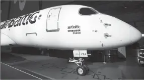  ?? Canadian Press photo ?? A Bombardier CS300 is shown during a ceremony to mark the first delivery of the commercial jetliner to Air Baltic in Mirabel, Que., Nov. 28, 2016.