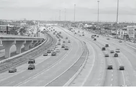  ?? Steve Gonzales / Houston Chronicle ?? Officials celebrated the completion of work widening Interstate 45 between Beltway 8 and Bay Area Boulevard. The freeway eventually will be widened to five lanes all the way to the Galveston Causeway.