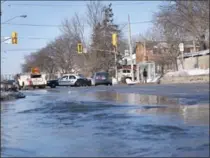  ?? HAMILTON SPECTATOR FILE PHOTO ?? A water main break on Upper Wellington created quite a flood in 2015. It was a cold year and frost went very deep in non snow-covered areas.