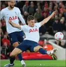  ?? ?? At full stretch: Ben Davies during his man-of-the-match display at Liverpool