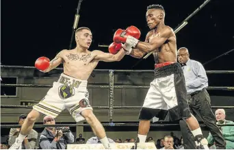  ?? /SYDNEY SESHIBEDI/GALLO IMAGES ?? Deejay Kriel and Xolisa Magusha during the Showstoppe­rs boxing event at Emperors Palace in April.