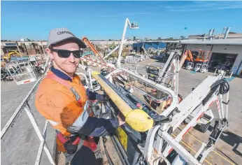  ?? Picture: TONY PHILLIPS PHOTOGRAPH ?? PERSISTENT: It was third time lucky for heavy vehicle mechanic Christophe­r Knight when it came to getting an apprentice­ship.
