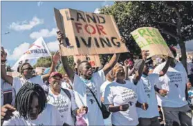  ??  ?? Reclaim: On Human Rights Day, protesters demanded that the City stops selling public land. Photo: Ashraf Hendricks/GroundUp