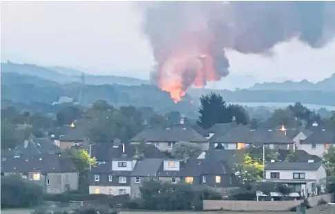  ?? ?? BLAZE: Flames were about 40ft high as firefighte­rs battled the fire at Dales Farm Cottage for seven hours.