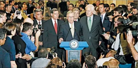  ?? CAROLYN KASTER/AP ?? Senate Majority Leader Mitch McConnell, with GOP leaders, speaks Tuesday to the media. A plan to simply repeal Obamacare was dead on arrival.
