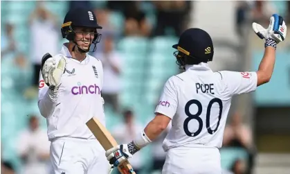  ?? ?? Zak Crawley (left) and Ollie Pope celebrate after Crawley hit the winning runs against South Africa. Photograph: Gareth Copley/Getty Images