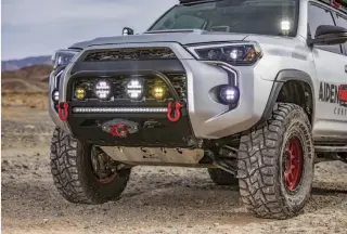  ??  ?? Rigid Industries lights up front, along with AJC embellishm­ents, add unique styling details to the look of this 4Runner.