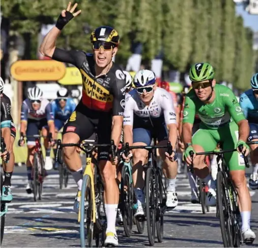  ?? BELGA ?? Drie keer won Wout van Aert in deze Tour: een bergrit, een tijdrit én de sprint op de Champs-Elysées.FOTO