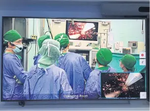  ??  ?? Real-time broadcasts of live surgery can be shown to medical students in different locations.