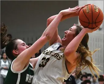  ?? STAFF PHOTO BY CHRIS CHRISTO — MEDIANEWS GROUP/BOSTON HERALD ?? Andover’s Anna Foley gets fouled by Wachusett’s Liz Cain during a recent tournament game. Undefeated Andover will play Bishop Feehan for the Division 1 state title.