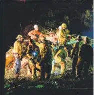  ??  ?? Los Angeles County firefighte­rs work at the scene Saturday where a large tree fell on a wedding party in Whittier, Calif. Keith Durflinger, The Whittier Daily News
