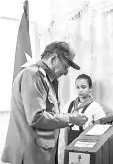  ?? — AFP photo ?? TV grab taken from Cuban Television hows Raul Castro casting his vote at a polling station in Santiago de Cuba Province.