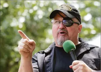  ?? Susan Walsh / Associated Press ?? Stewart Rhodes, founder of the citizen militia group known as the Oath Keepers speaks during a rally outside the White House on June 25, 2017. Rhodes formally launched the Oath Keepers in Lexington, Mass., on April 19, 2009, where the first shot in the American Revolution was fired.