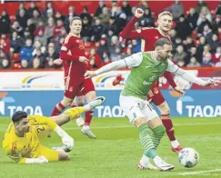  ?? ?? Martin Boyle, right, hit back at trolls on social media with his ‘diving’ celebratio­n against Aberdeen. Above, Boyle scores to make it 1-0. Below right, Dons skipper Graeme Shinnie applauds the home fans