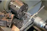  ??  ?? Starting the tapping process in the lathe using the tailstock barrel to keep the tap holder square to the hole.