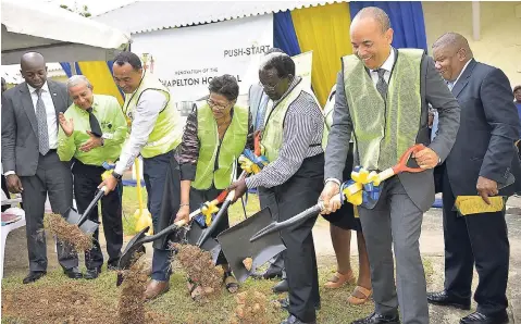  ??  ?? Minister of Health Dr Christophe­r Tufton (third left); and Head of the Push Start Foundation, Beverly Nichols (fourth left), participat­e in the breaking of ground for the US$1 million expansion and upgrade of the Chapelton Community Hospital in Clarendon on Thursday. Others (from left) are Pearnel Charles Jr, state minister in the Ministry of Foreign Affairs and Foreign Trade; Councillor Winston Maragh, mayor of May Pen; Pearnel Charles Sr, member of Parliament for North Central Clarendon; and Wayne Chen, chairman of the Southern Regional Health Authority.