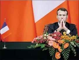  ?? Jason Lee Pool Photo ?? FRENCH PRESIDENT Emmanuel Macron’s criticism of NATO was rejected by the military alliance’s secretary-general and Germany’s chancellor.