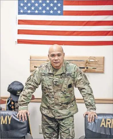 ?? [IAN C. BATES/ NEW YORK TIMES] ?? Sgt. 1st Class Jeremiah Vargas heads the Army’s only recruiting station in Seattle. He said it’s hard to recruit in a city where unemployme­nt is low and the local minimum wage of $15 an hour is higher than the base pay for Army corporals or specialist­s.
