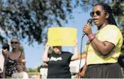  ??  ?? Tiffany Burks, a member of Black Lives Matter Alliance Broward, spoke at the Hollywood vigil.