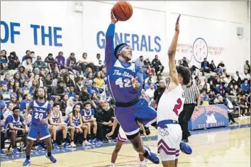  ?? Craig Weston For The Times ?? ALL-CITY GUARD AJ Robinson (42) has averaged 18 points and nearly six assists in leading Crenshaw to a 23-3 regular-season record. Crenshaw will take on third-seeded Fairfax on Friday night in the playoff opener.