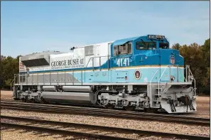  ?? Submitted photo ?? UP No. 4141, a special locomotive honoring the late President George H.W. Bush, left North Little Rock’s Union Pacific maintenanc­e facility Saturday, bound for Spring, Texas. It will pull Bush’s funeral train from Spring to College Station, Texas, as part of the former president’s funeral.