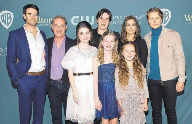  ?? KEVORK DJANSEZIAN/GETTY ?? From left, Ben Lawson, Richard Thomas, Marcelle LeBlanc, Christian Finlayson, Tatum Matthews, Callaway Corrick, Bellamy Young and Logan Shroyer, seen Nov. 13, are cast in “The Waltons: Homecoming.”