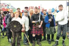  ??  ?? Paul Macdonald, originally from Glenuige, led a sword demonstrat­ion as part of the Highland Challenge in which 12 people from America took part. 21_ F32 Arisaig Games_ sword demo 01