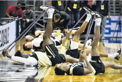  ?? PHOTO: USA TODAY ?? Effective or not? Members of the Purdue Boilermake­rs team stretch during their practice for a recent NCAA Tournament game in Louisville, Kentucky. A 2016 research review found that while stretching could improve flexibilit­y in the long term, it reduced neither postexerci­se muscle soreness nor injuries in runners.