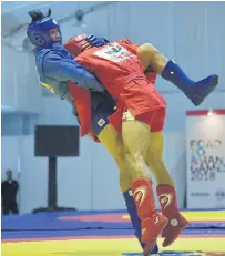  ??  ?? Sambo is a martial art developed by Russia’s Red Army.