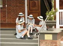  ?? PHOTO: PAUL CASTLE ?? CLOSE BONDS: Students enjoying recess at Clayfield College.