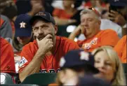  ?? MATT SLOCUM - THE ASSOCIATED PRESS ?? Fans watch during the eighth inning of Game 2 of the baseball World Series between the Houston Astros and the Washington Nationals Wednesday, Oct. 23, 2019, in Houston.