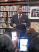  ?? TRENTONIAN FILE PHOTO ?? Councilman Duncan Harrison announced his run for mayor at the Trenton Library as several people in the crowd share the speech on social media.