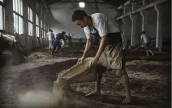  ??  ?? Distillers in Maotai along the Chishui River produce well over half of the country’s baijiu.