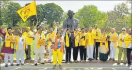  ?? KUMAR/HT PHOTO ?? Members of Telugu Desam Party (TDP) stage a protest demanding special category status for Andhra Pradesh during the budget session, at Parliament House in New Delhi on Wednesday.SUSHIL