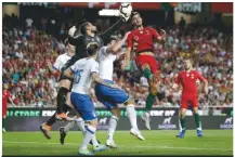  ??  ?? Pressure...Portugal’s Andre Silva causes problems for Italy’s defence