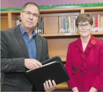  ?? GREG PENDER/The StarPhoeni­x Former RCMP assistant commission­er Russ Mirasty and Patricia Prowse, a superinten­dent of Education with Saskatoon Public Schools, were both named as student first advisers on Monday at St. Marguerite School by Education Ministe ??