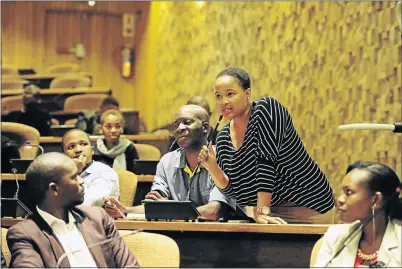  ??  ?? HELP US TEACH: Tokologo Monene poses a question to the panel during the Unisa-Sowetan Dialogues on basic education at Unisa, Pretoria