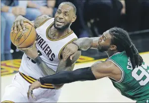  ?? AP PHOTO ?? Cleveland Cavaliers’ LeBron James (left) goes up for a shot against Boston Celtics’ Jae Crowder during Game 4 of the NBA Eastern Conference finals Tuesday in Cleveland.