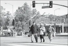  ?? Al Seib Los Angeles Times ?? SOME COMMUNITY members question why a redesign of the Vermont Triangle median, introduced more than a year ago by local groups, isn’t moving faster.