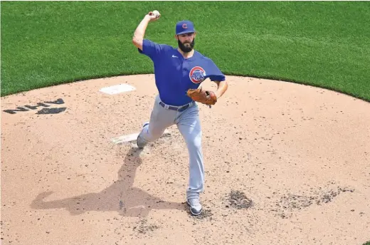  ?? JOE SARGENT/GETTY IMAGES ?? Though he didn’t have his best command, Jake Arrieta earned his second victory of the season, allowing two runs in six innings Thursday.