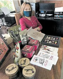  ??  ?? Malagos Garden Resort sales manager Analyn Ortilano (above) oversees the online store. (Photo below) Malagos chocolates